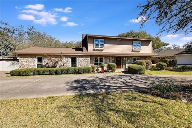 View of charming Dutch Colonial home.