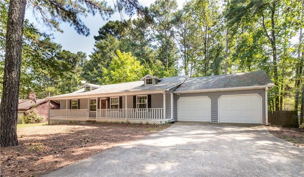 Front of the house with two-car garage.