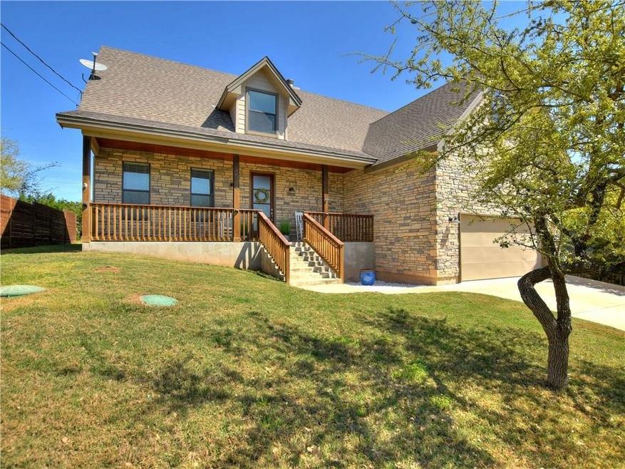 Welcome home!!! Enjoy a cold beer with friends on your spacious covered porch.  