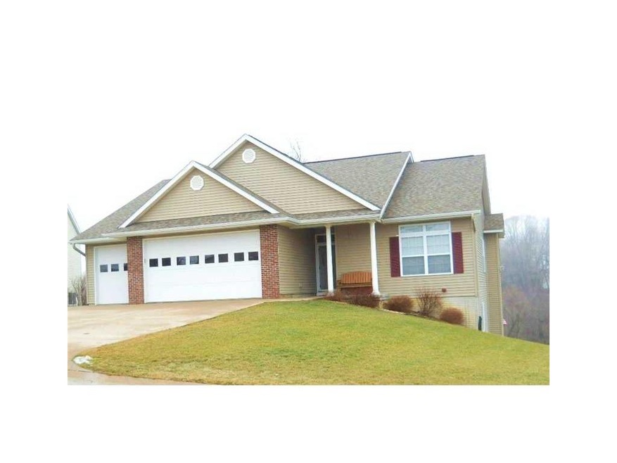 Front Exterior. Inviting home sitting in wooded de