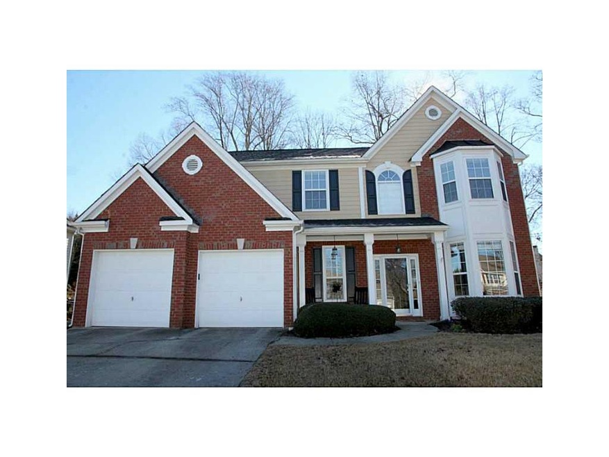 Exterior Front. Front Porch and Bay Windows set th
