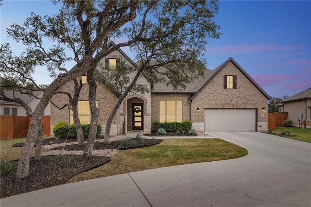 This Exceptional Drees Custom Home is Set on a Lar