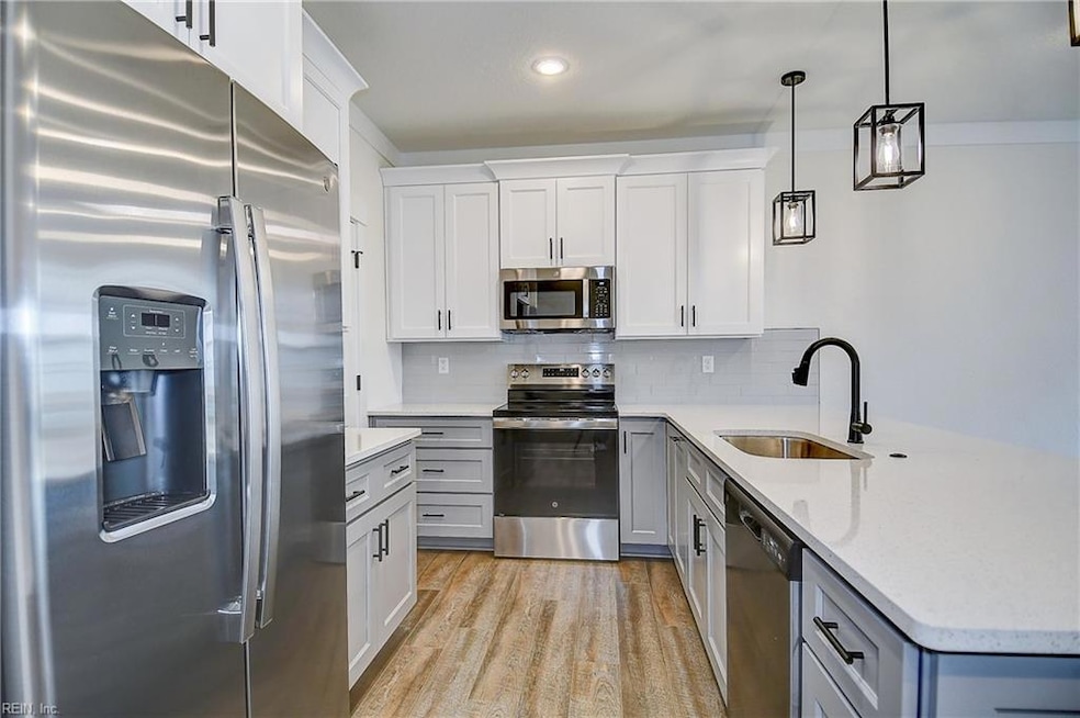 Sample photo kitchen. Appliances will be GE profile stainless steel.