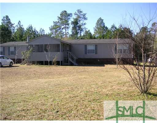Exterior Front. HUGE mobile home in GREAT conditio