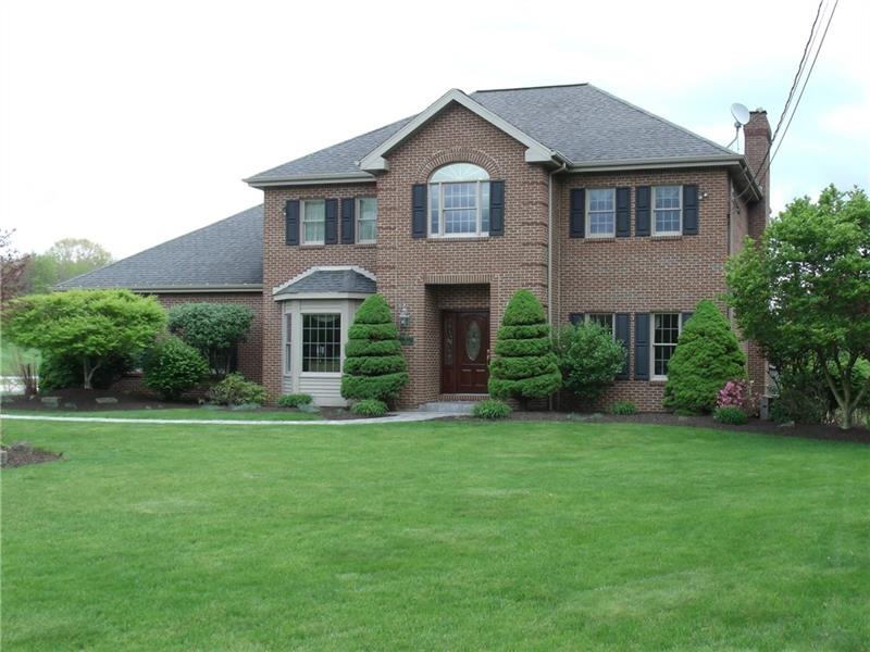 STATELY ALL BRICK COLONIAL WITH 2 CAR ATTACHED GAR