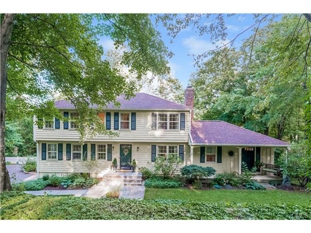 A peaceful setting on two acres for this light and