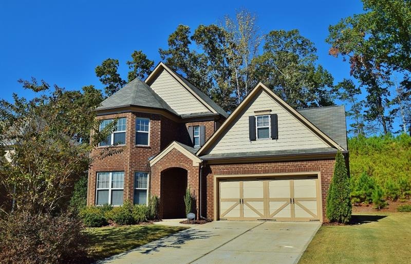 Beautiful brick home boasts 2 bay windows