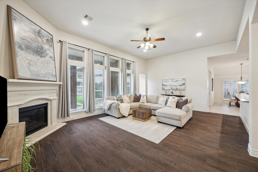 Spacious living yet cozy living room with gas fire