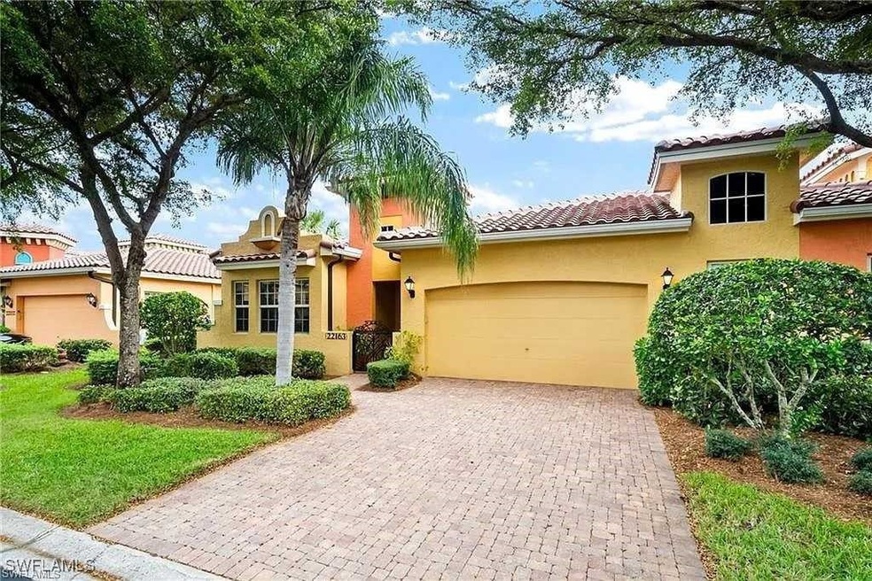 Mediterranean / spanish-style home with a tile roo