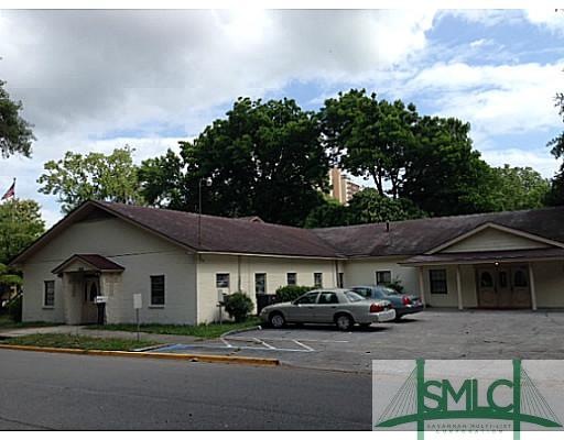 Exterior Front. Located on more than .5 acre, this