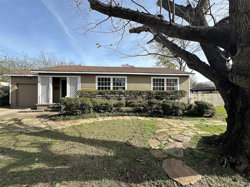 View of front of house featuring a landscaped yard