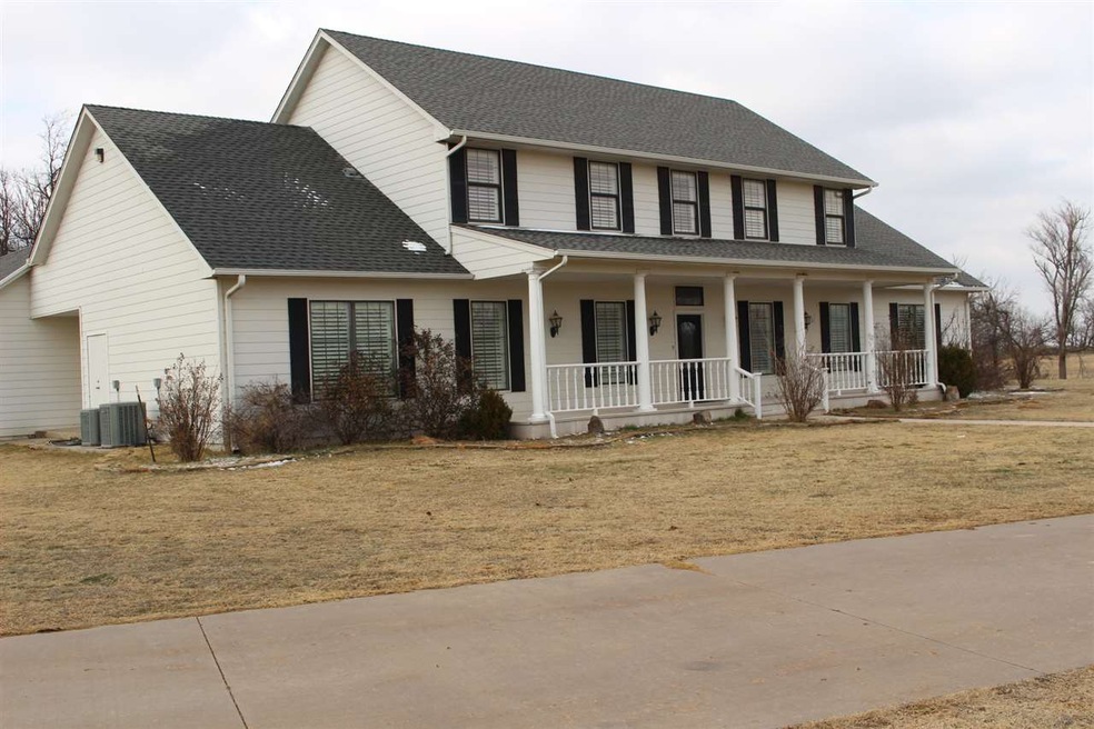 Spectacular home sitting on 10+ acres!  Features g