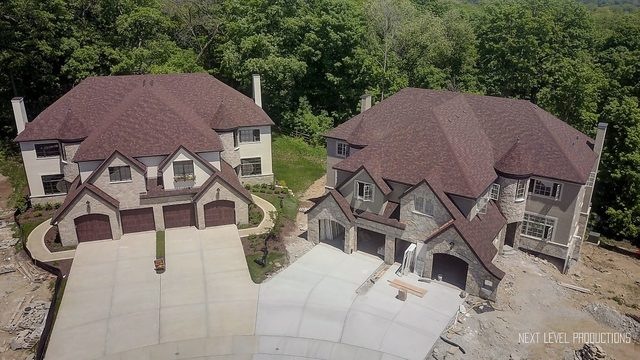 Front of home, concrete drive, backs to Seager Par
