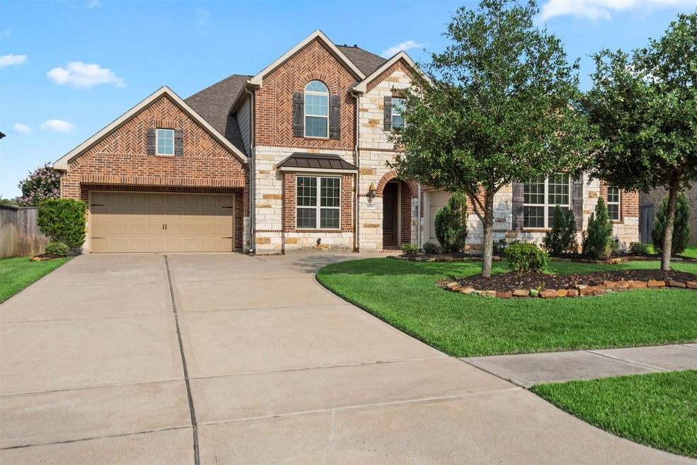 Welcome Home to 18923 Wild Thornberry in the sought after neighborhood of Wildwood at Northpointe.