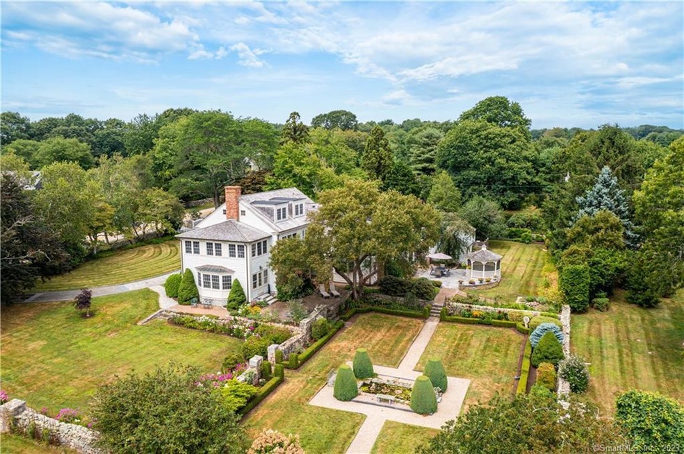 1.93 Manicured Acres with Circular Driveway.