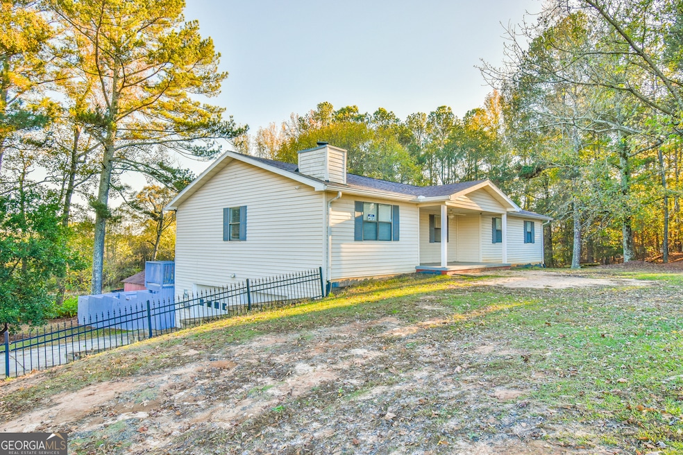 2933 Indian Shoals Rd, Dacula, GA 30019 - photo 1