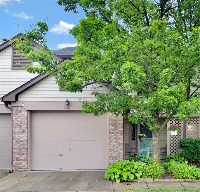 Inviting walk way leading to private entrance. Attached garage w/ opener.