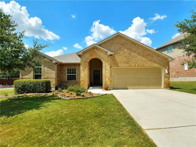 This one story beauty is tucked at the back of a very peaceful neighborhood with an oversized 3 car garage