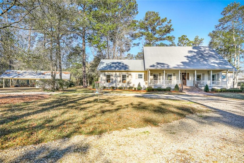 Country Acadian with deep setback to 5.02 acres