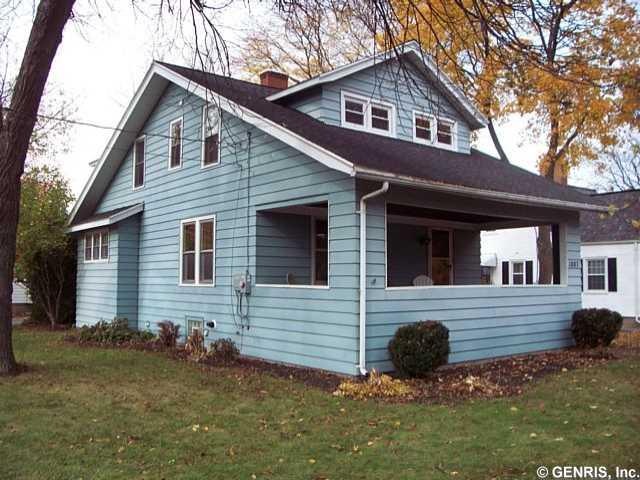 Exterior Front Mature treed yard with unique lands