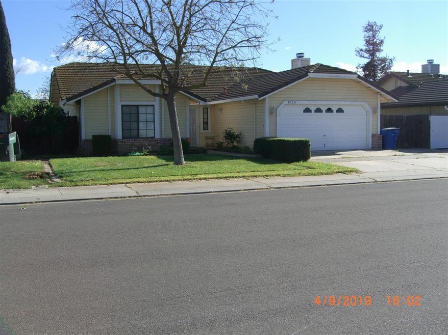 Single story home with 1693 square feet and featur