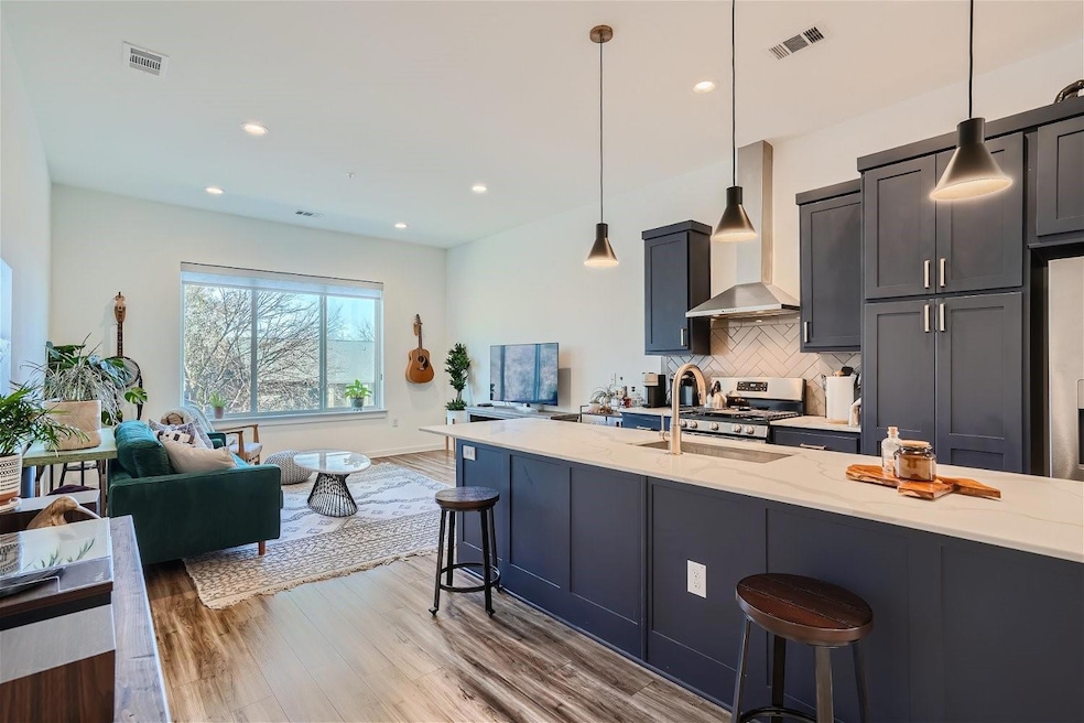 A beautiful kitchen that opens into the living room. A great space for entertaining.