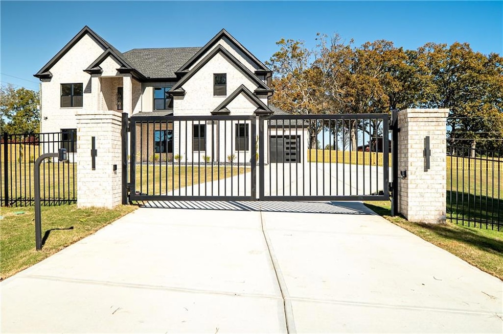 Gate featuring a fenced front yard