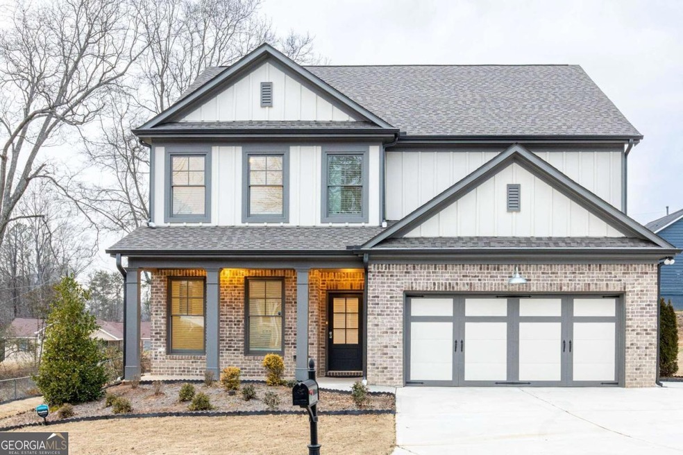 569 Jackson St, Buford, GA 30518 - photo 1