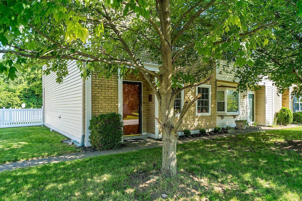 Clean & Move-In Ready End Unit!