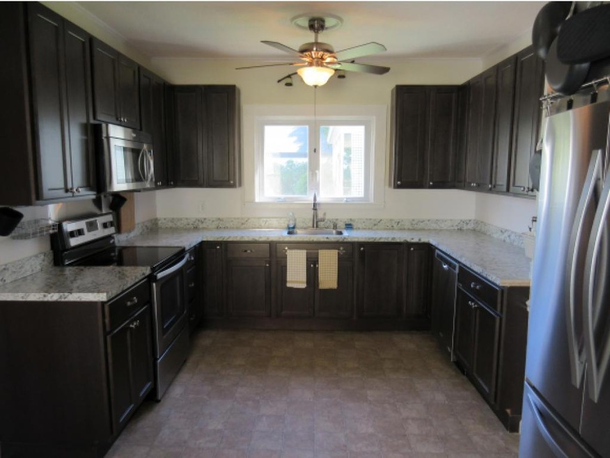 77 Orchard St, Franklin, NH 03235 - photo 1