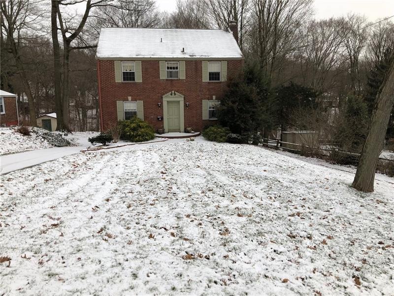 Beautiful brick colonial with 1/2 acre lot