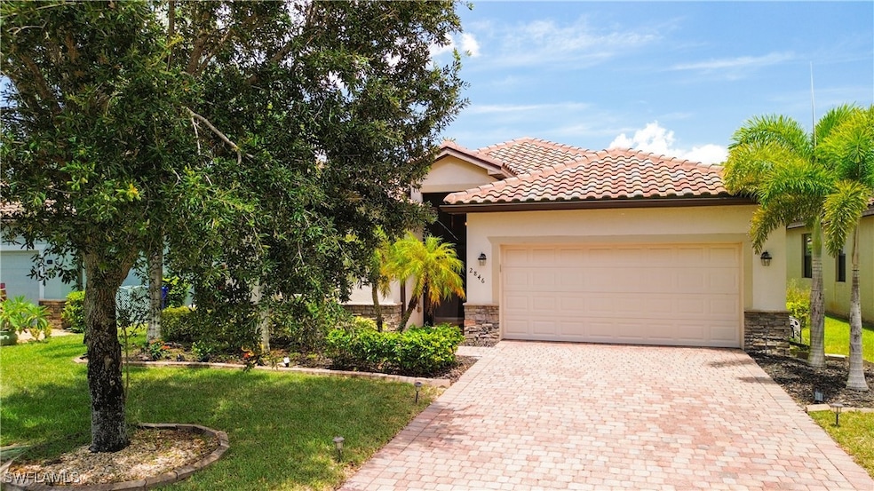 View of front of house featuring stone siding, stu