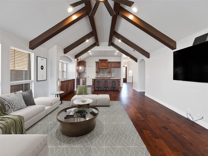 Virtual Staged Living area with vaulted ceilings, recessed and  natural light