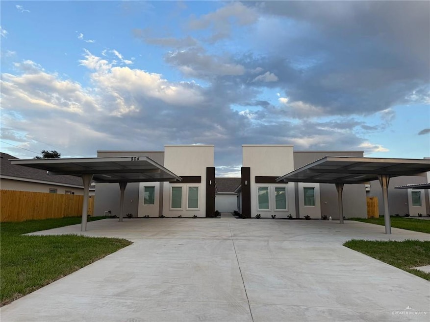 View of front of property featuring a carport