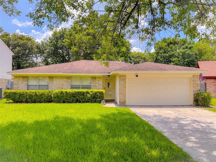 10115 Swirling Winds Dr, Houston, TX 77086 - photo 1