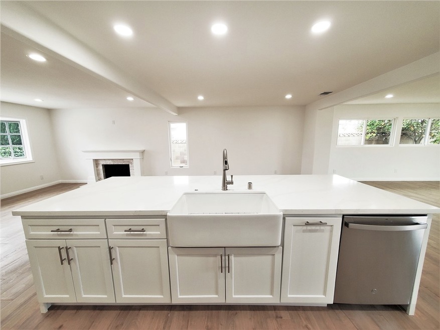 11.View of island with sink looking  towards Dining room