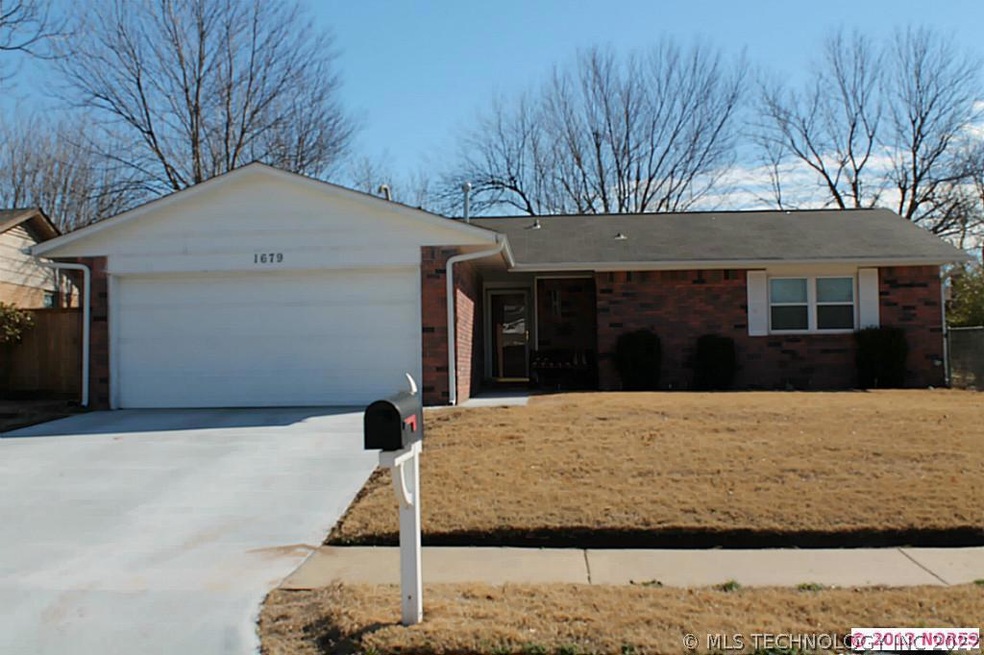 Full Brick, Newer Roof and New Driveway!