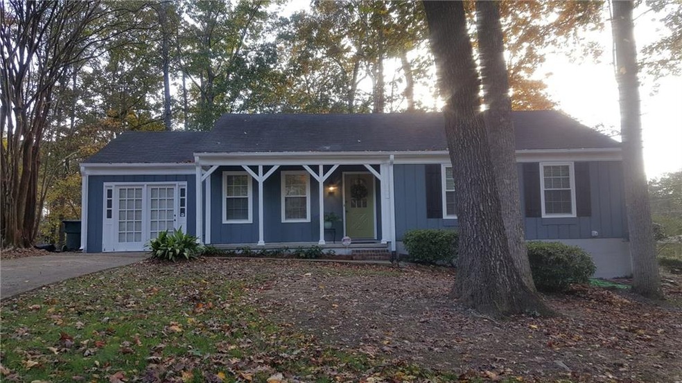 Nice 3/2 ranch with enclosed garage as bonus room.