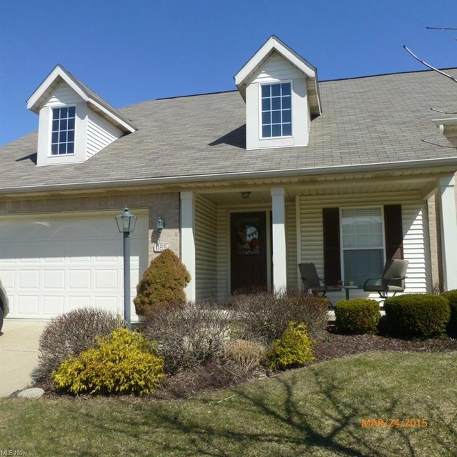 Stone and Vinyl exterior with covered front porch 