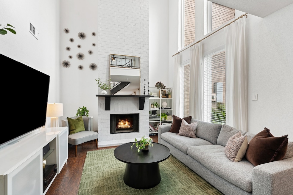 This inviting living room features a high ceiling