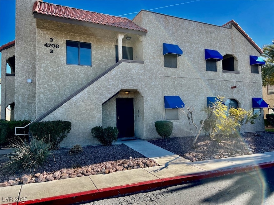 View of front of property with stucco siding and a