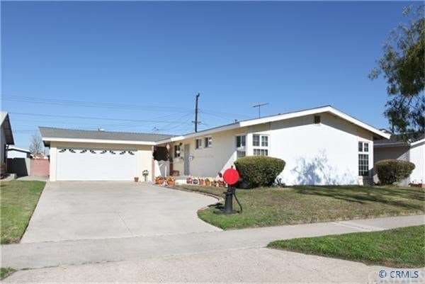 Nicely Maintained Exterior with Large Driveway for