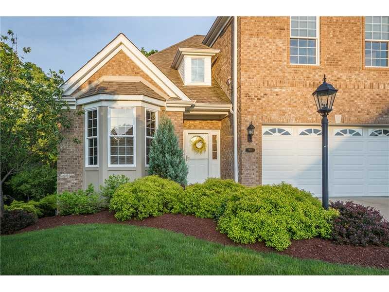 Exterior Front. Stunning Carriage home in 