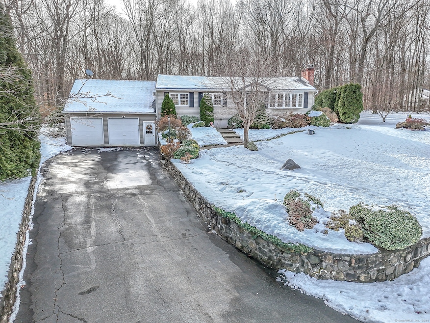 Country setting with stone walls and tree lined pr