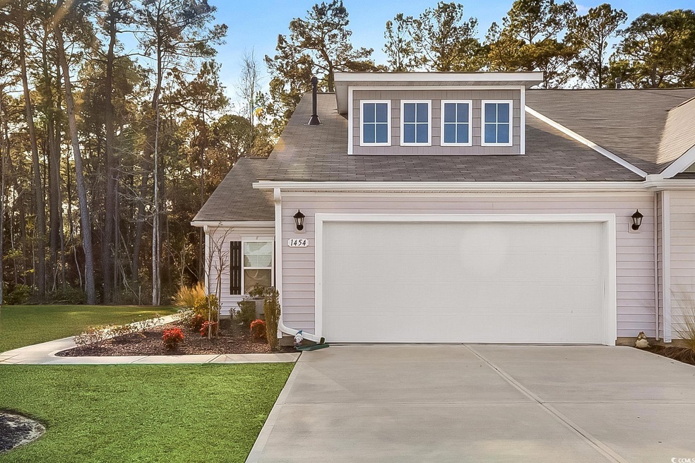 View of front of property with a front lawn and a 