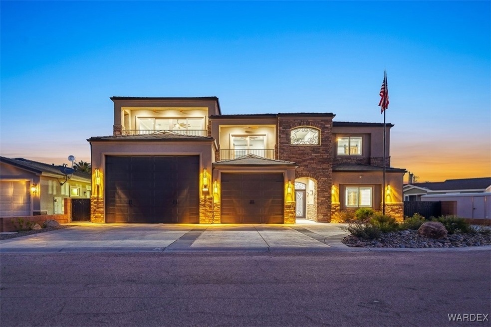 View of front of home featuring a garage
