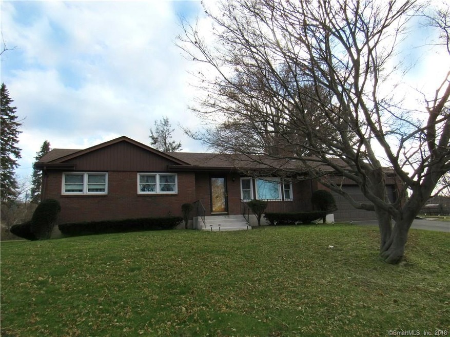 Brick Ranch style home situated on .46 acre corner