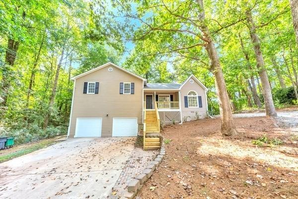 View of front of property with a garage