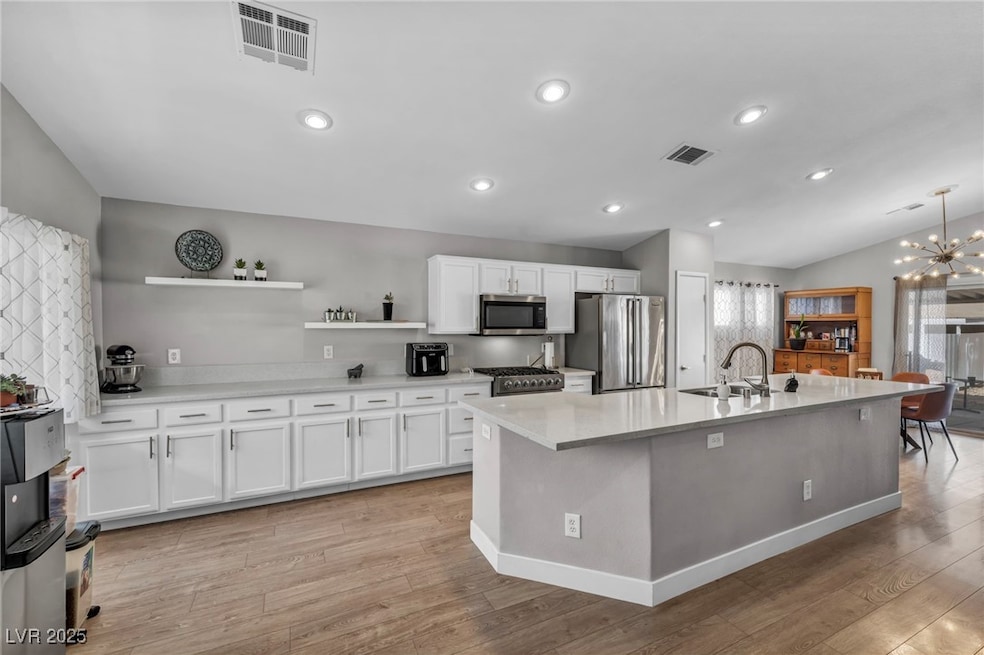 Kitchen featuring stainless steel appliances, open