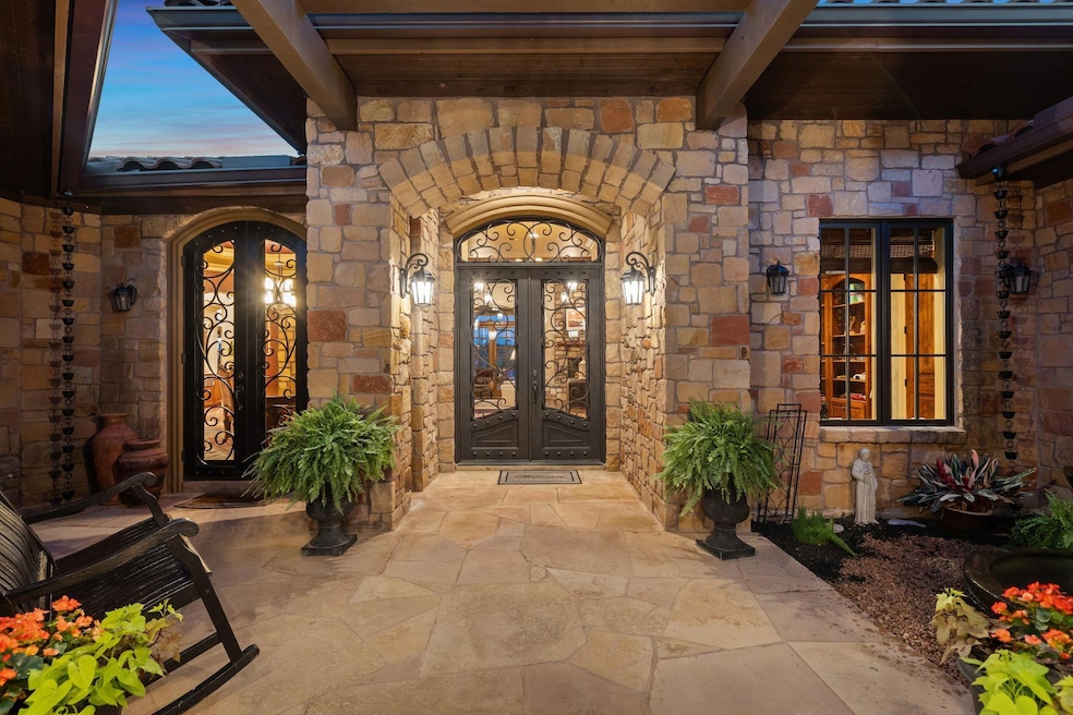 View of exterior entry featuring french doors and